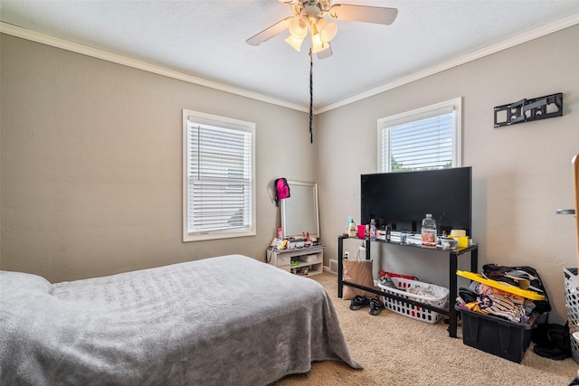 1452 55th St, Des Moines, IA 50311 - carpeted bedroom featuring crown molding and a ceiling fan