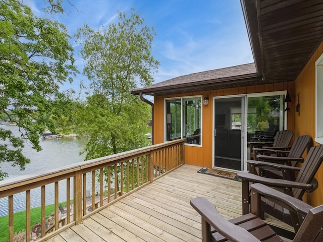201 Cottage Ln, Montezuma, IA 50171 - wooden deck featuring a water view