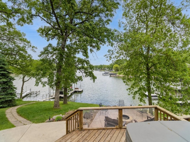 201 Cottage Ln, Montezuma, IA 50171 - dock with a water view and a lawn