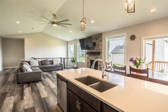 3021 NE 17th St, Ankeny, IA 50021 - kitchen with a sink, open floor plan, dishwasher, vaulted ceiling, and light countertops