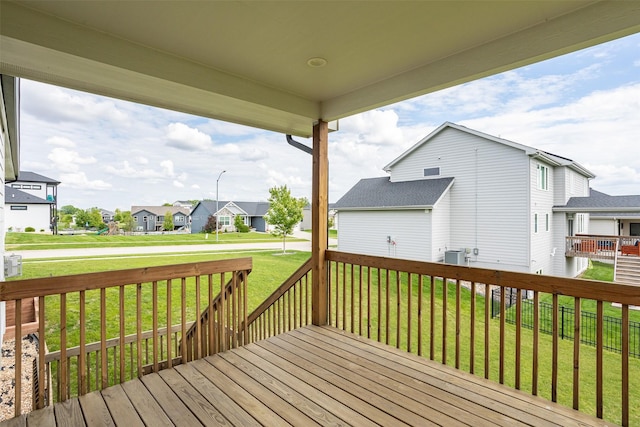3021 NE 17th St, Ankeny, IA 50021 - wooden terrace featuring a residential view and a lawn