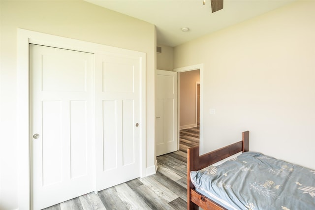 3021 NE 17th St, Ankeny, IA 50021 - bedroom with wood finished floors and a closet
