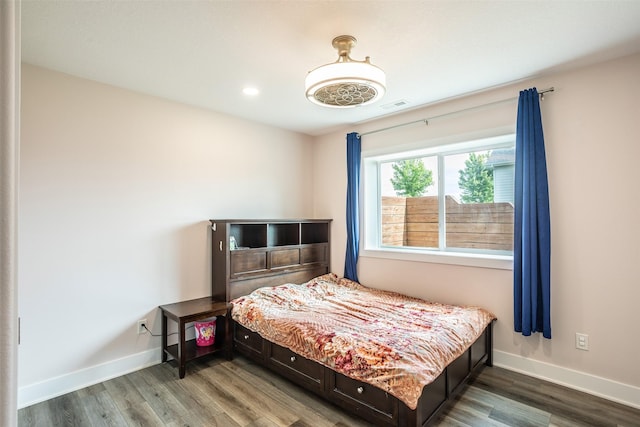 3021 NE 17th St, Ankeny, IA 50021 - bedroom featuring wood finished floors, baseboards, and recessed lighting