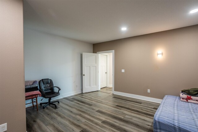 3021 NE 17th St, Ankeny, IA 50021 - bedroom with wood finished floors, baseboards, and recessed lighting