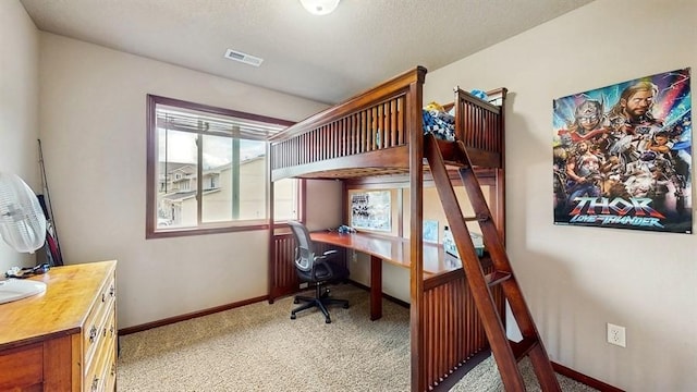 1401 N 6th St Unit 7, Indianola, IA 50125 - bedroom featuring light carpet, a desk, and baseboards