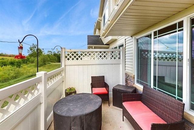 1401 N 6th St Unit 7, Indianola, IA 50125 - view of patio / terrace featuring a balcony