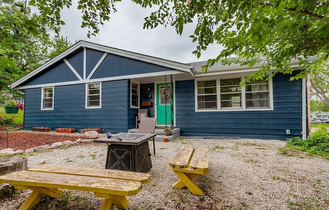 3020 62nd St, Des Moines, IA 50322 - view of front of house featuring an outdoor fire pit