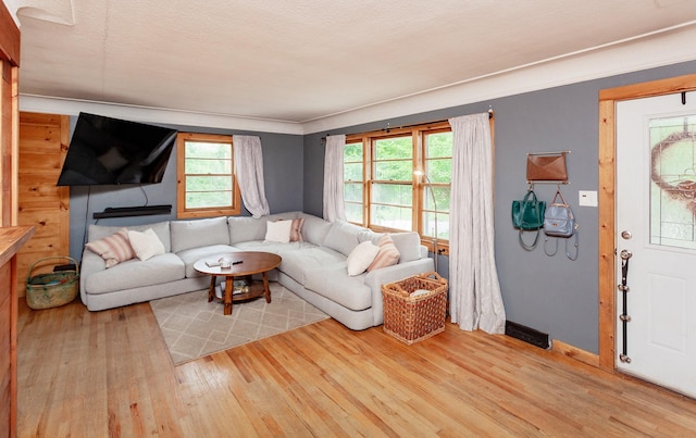 3020 62nd St, Des Moines, IA 50322 - living room featuring wood finished floors and baseboards