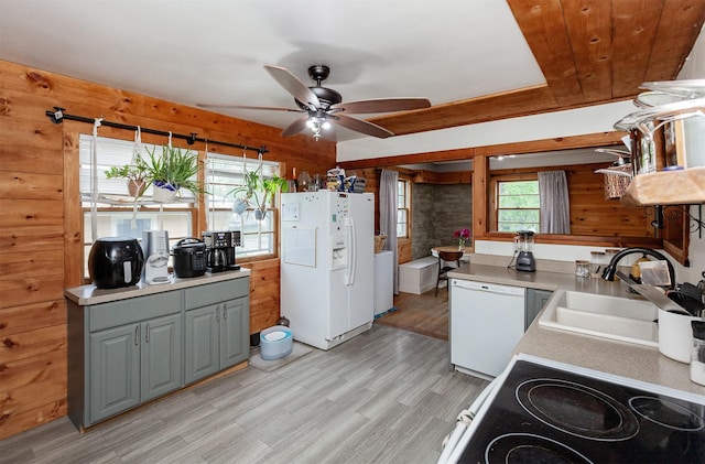3020 62nd St, Des Moines, IA 50322 - kitchen with white appliances, gray cabinets, a ceiling fan, a sink, and light wood-type flooring