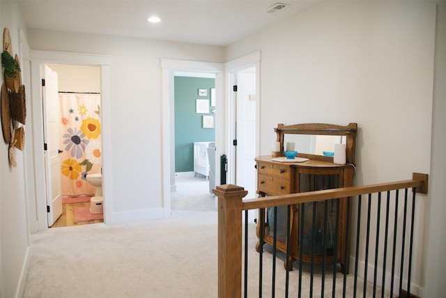 3338 9th Ave SW, Altoona, IA 50009 - hall with an upstairs landing, carpet flooring, baseboards, and recessed lighting