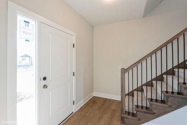 3418 5th Ave SE, Altoona, IA 50009 - entrance foyer featuring wood finished floors, baseboards, and stairway