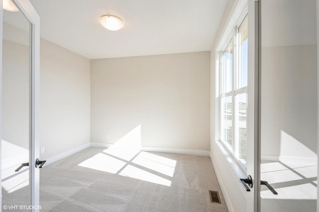 3418 5th Ave SE, Altoona, IA 50009 - empty room featuring carpet flooring and baseboards
