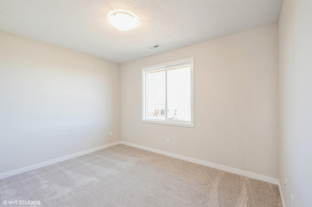 3418 5th Ave SE, Altoona, IA 50009 - unfurnished room featuring light colored carpet and baseboards