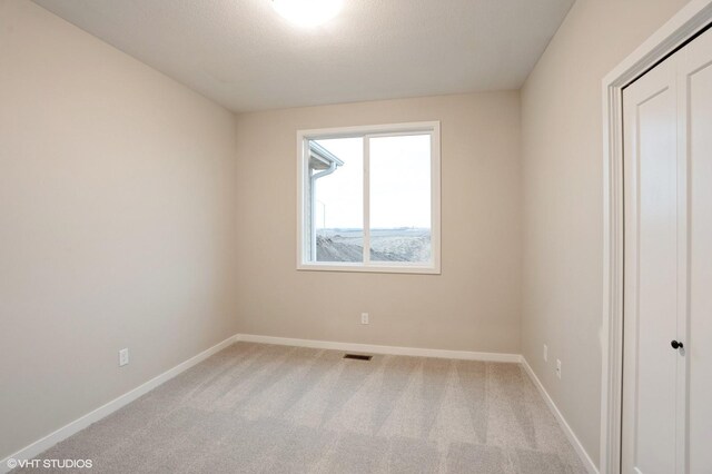 3424 5th Ave SE, Altoona, IA 50009 - carpeted spare room with baseboards