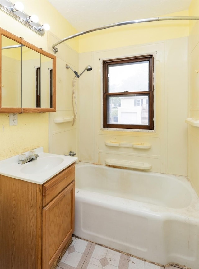 2721 Cornell St, Des Moines, IA 50313 - full bathroom featuring vanity and shower / tub combination