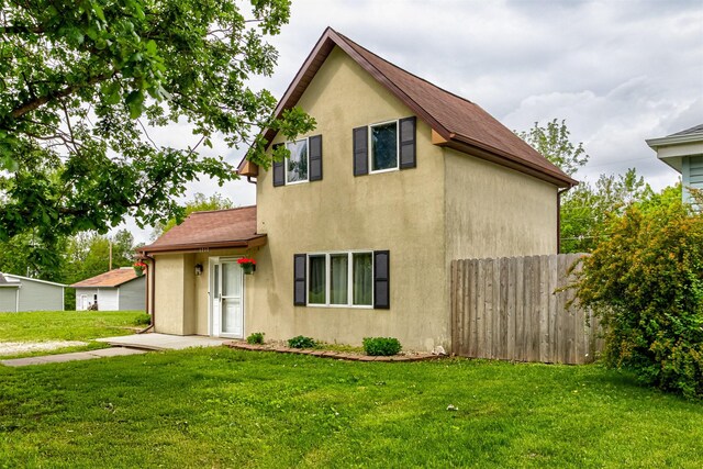 1717 Linn St, Boone, IA 50036 - view of front of house with stucco siding and roof with shingles