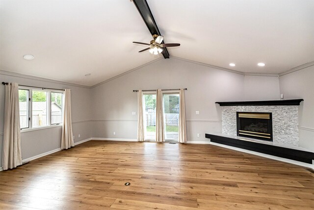 1717 Linn St, Boone, IA 50036 - unfurnished living room featuring light wood-style flooring, ceiling fan, a glass covered fireplace, baseboards, and recessed lighting