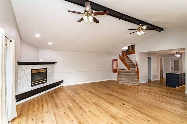 1717 Linn St, Boone, IA 50036 - unfurnished living room with a ceiling fan, light wood finished floors, stairs, baseboards, and crown molding
