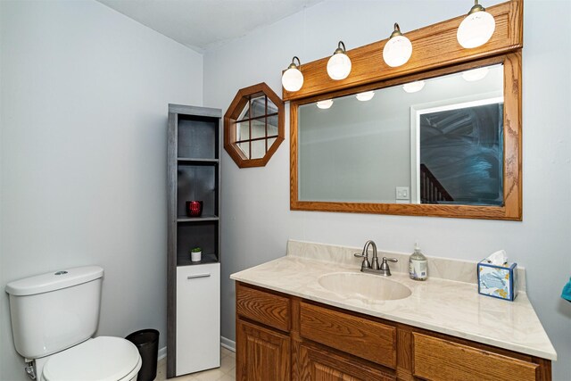 1717 Linn St, Boone, IA 50036 - half bath with toilet, vanity, baseboards, and tile patterned floors