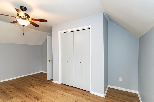 1717 Linn St, Boone, IA 50036 - additional living space with vaulted ceiling, ceiling fan, light wood-style floors, and baseboards