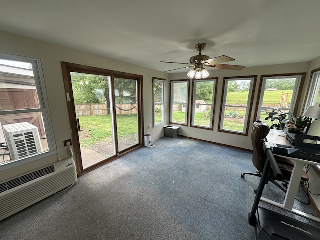 303 S Dewey St, Osceola, IA 50213 - sunroom / solarium featuring carpet flooring