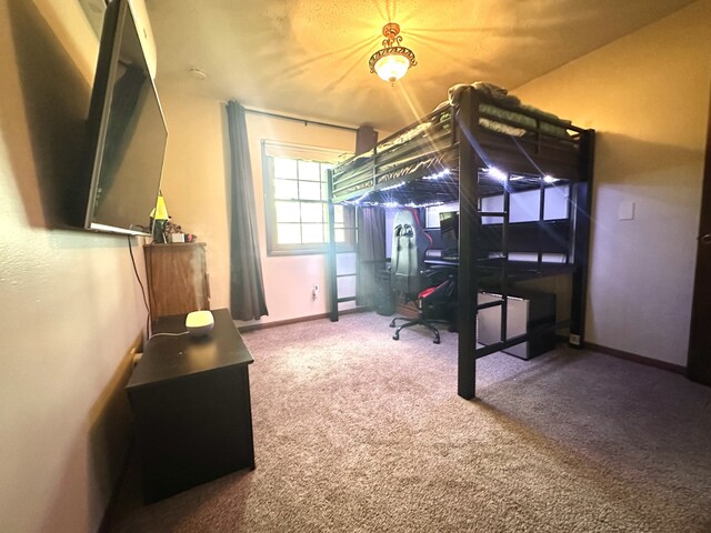 303 S Dewey St, Osceola, IA 50213 - bedroom featuring carpet, a desk, and baseboards