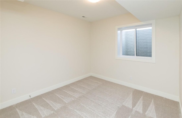 733 17th Ave SE, Altoona, IA 50009 - unfurnished room featuring light colored carpet and baseboards