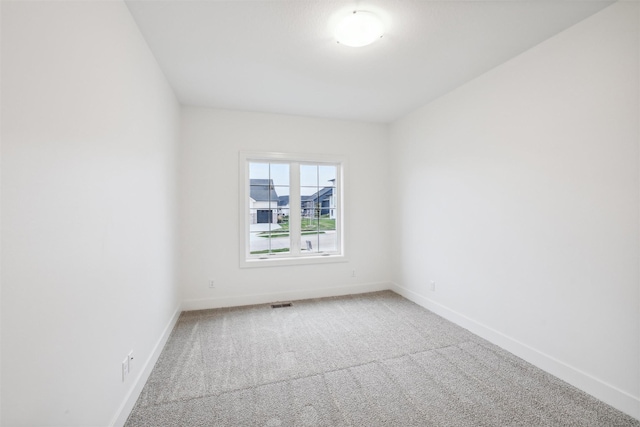 17865 Valley View Dr, Clive, IA 50325 - carpeted empty room featuring baseboards