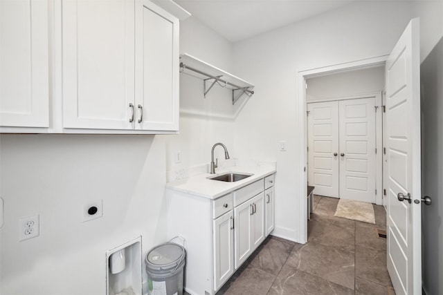 17865 Valley View Dr, Clive, IA 50325 - laundry room with cabinet space and hookup for an electric dryer