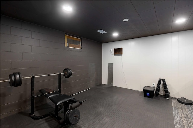 403 S Elm St, Lamoni, IA 50140 - workout area with recessed lighting and concrete block wall