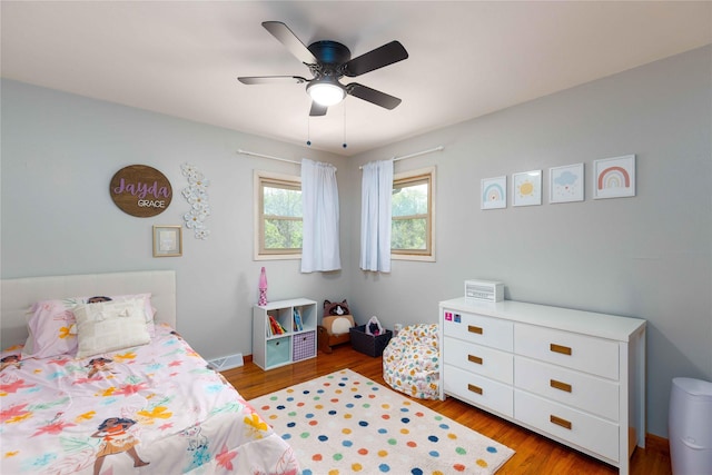 403 S Elm St, Lamoni, IA 50140 - bedroom featuring wood finished floors and a ceiling fan