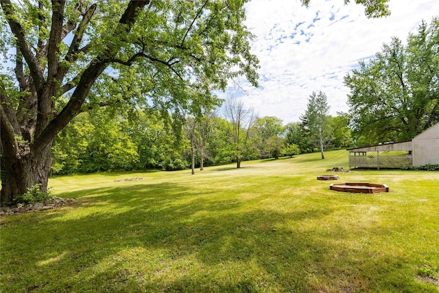 403 S Elm St, Lamoni, IA 50140 - view of grassy yard featuring view of scattered trees