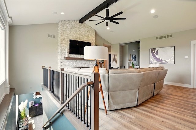 1108 NE Forest Ridge Ct, Ankeny, IA 50021 - living room with a ceiling fan, wood finished floors, and baseboards