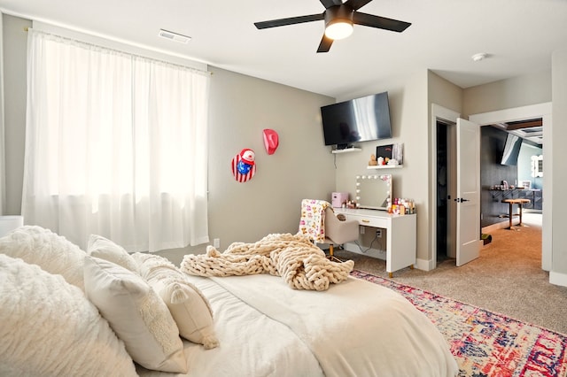 1108 NE Forest Ridge Ct, Ankeny, IA 50021 - carpeted bedroom with ceiling fan and baseboards