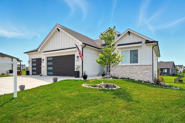 1108 NE Forest Ridge Ct, Ankeny, IA 50021 - view of front facade with board and batten siding, stone siding, a garage, and a front lawn
