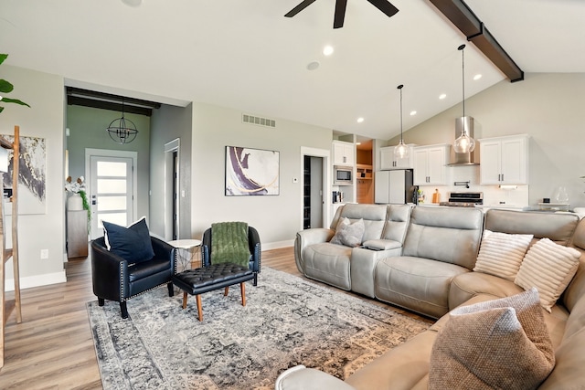 1108 NE Forest Ridge Ct, Ankeny, IA 50021 - living area with beamed ceiling, light wood-style floors, ceiling fan, baseboards, and recessed lighting