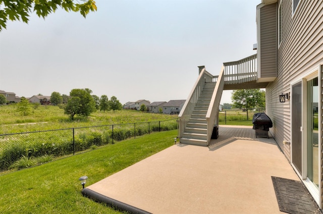 1245 Blue Bonnet Dr, Carlisle, IA 50047 - view of patio with stairs, grilling area, and a wooden deck
