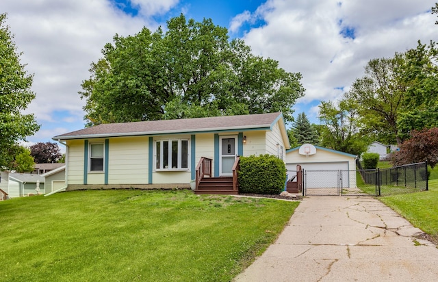706 S Buxton St, Indianola, IA 50125 - view of front of home featuring a gate, a detached garage, and an outdoor structure