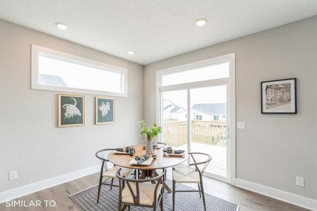 4208 NE 5th St, Ankeny, IA 50021 - dining area with wood finished floors, baseboards, and recessed lighting