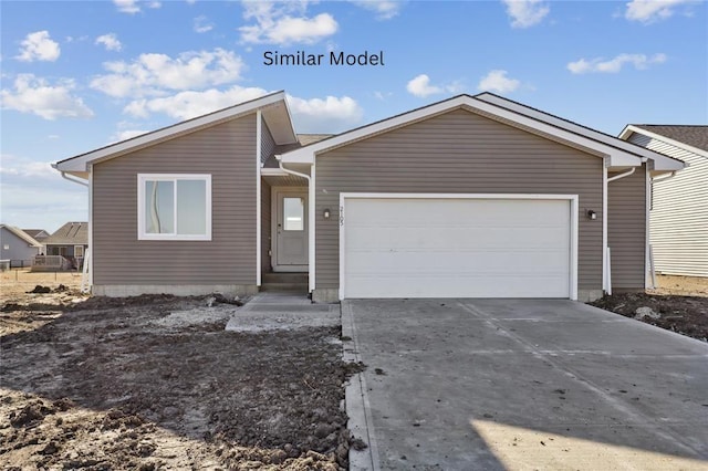 405 Napoli Ave, West Des Moines, IA 50266 - view of front of home with concrete driveway and an attached garage
