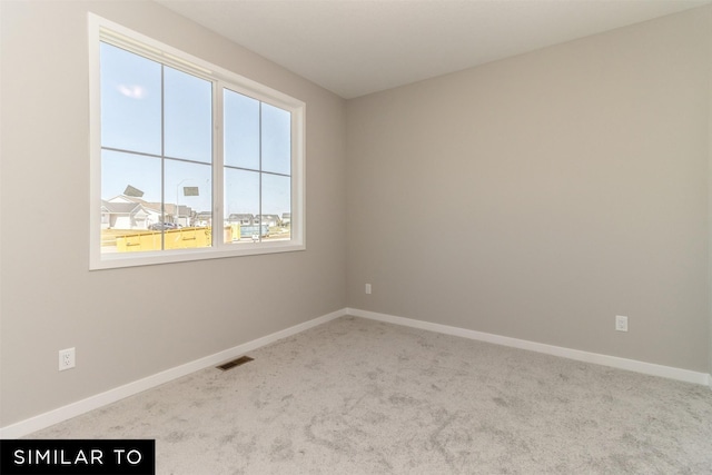 4212 NE 5th St, Ankeny, IA 50021 - carpeted spare room with baseboards