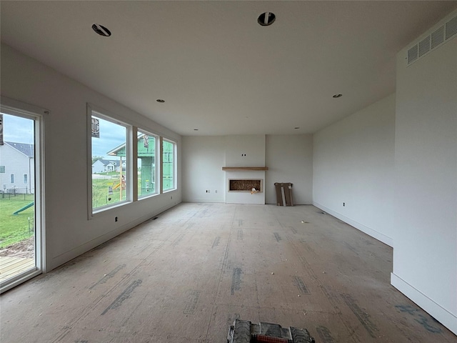 1845 Silver Maple Dr, Norwalk, IA 50211 - unfurnished living room featuring a fireplace and baseboards