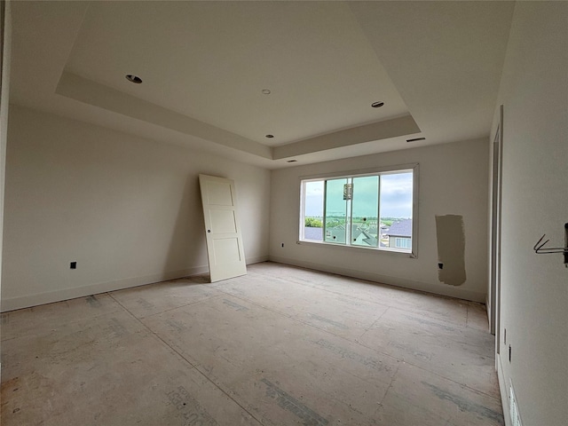1845 Silver Maple Dr, Norwalk, IA 50211 - empty room featuring a raised ceiling and baseboards