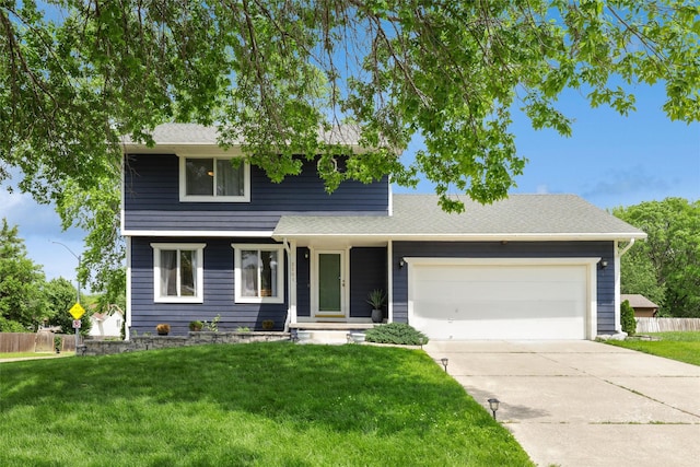 2501 SE 18th Ct, Des Moines, IA 50320 - traditional-style house featuring a garage, driveway, and roof with shingles