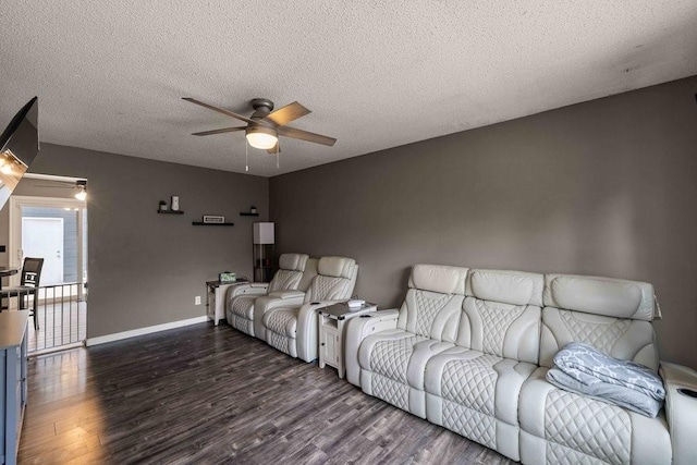 1863 Glenwood Cir, Des Moines, IA 50320 - cinema room with a ceiling fan, wood finished floors, a textured ceiling, and baseboards