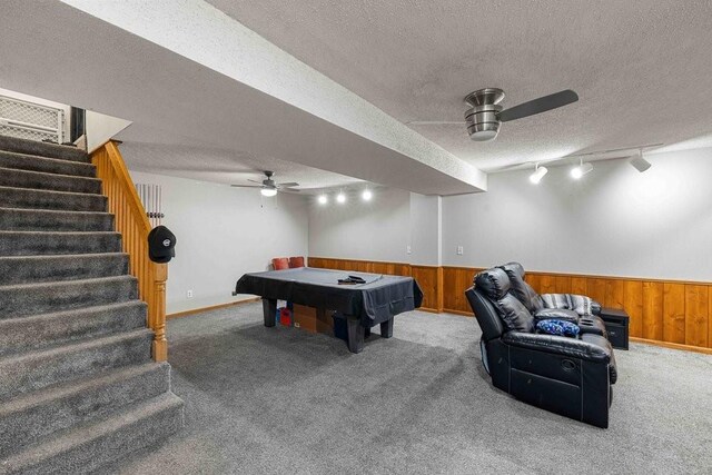 1863 Glenwood Cir, Des Moines, IA 50320 - recreation room featuring a textured ceiling, wooden walls, carpet, a ceiling fan, and billiards