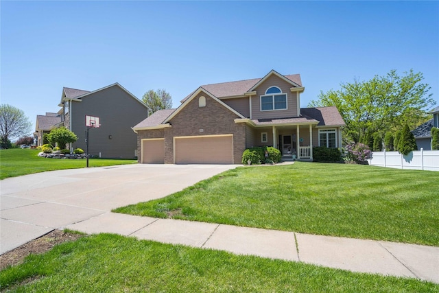 3904 153rd St, Urbandale, IA 50323 - view of front of home featuring a garage, driveway, covered porch, and brick siding