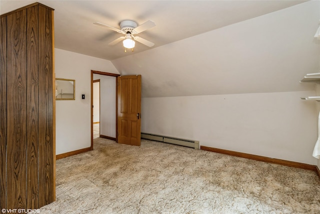 1723 6th St, Perry, IA 50220 - bonus room with a baseboard radiator, carpet floors, lofted ceiling, ceiling fan, and baseboards