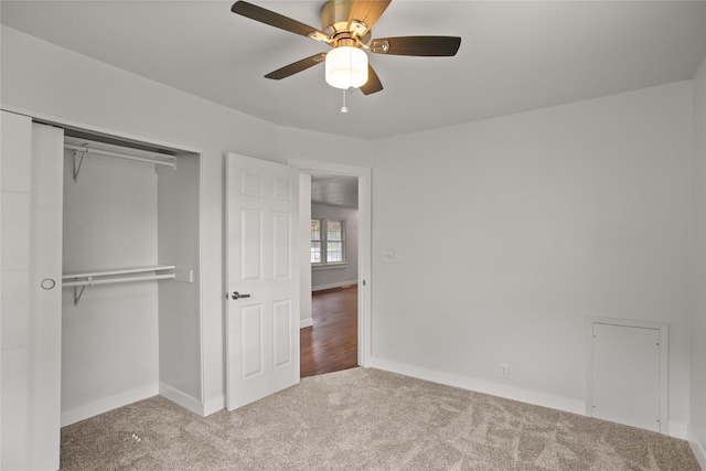 817 Roberts Ter, Marshalltown, IA 50158 - unfurnished bedroom featuring carpet, a closet, baseboards, and a ceiling fan