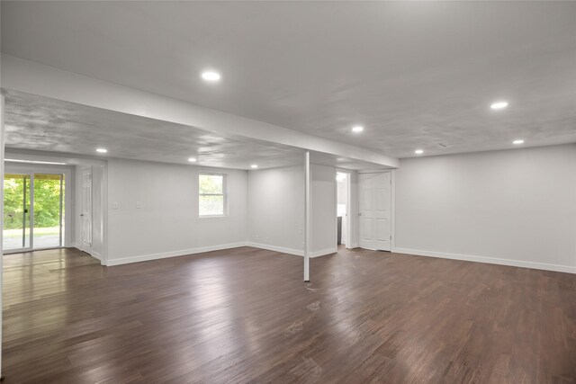817 Roberts Ter, Marshalltown, IA 50158 - basement featuring recessed lighting, dark wood-style flooring, and baseboards